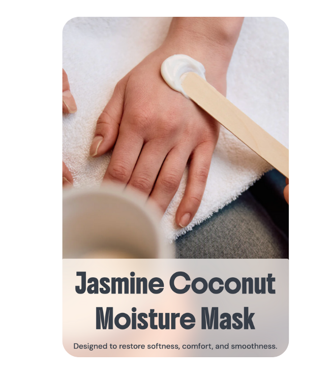 Professional applying a Jasmine Coconut Moisture Mask with a wooden applicator to a hand, part of a heated hydration wrap treatment for deep softness at River Oaks Thai Massage in Houston.
