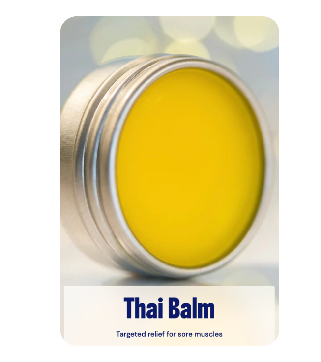 Professional-grade yellow Traditional Thai Balm in a metal container used for targeted relief of sore muscles at River Oaks Thai Massage in Houston.